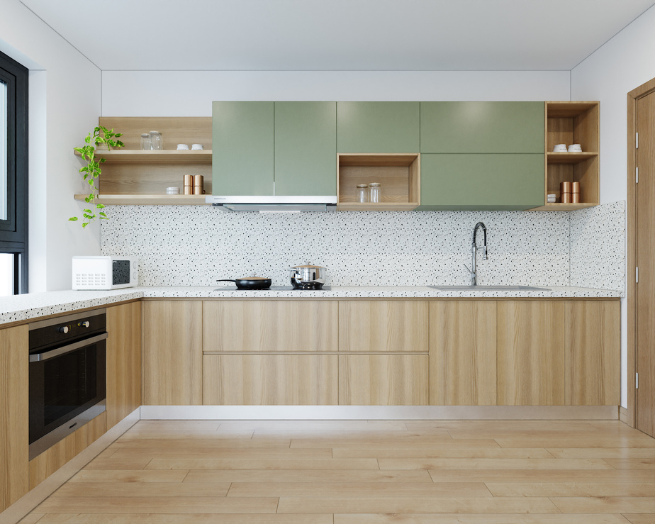 Không gian bếp trở nên “xanh” mát hơn nhờ sự kết hợp giữa màu gỗ sáng tự nhiên và màu xanh ngọc bắt mắt. Ngoài ra, họa tiết hoa văn mới mẻ cũng tạo nên một điểm nhấn thú vị và nổi bật cho không gian.