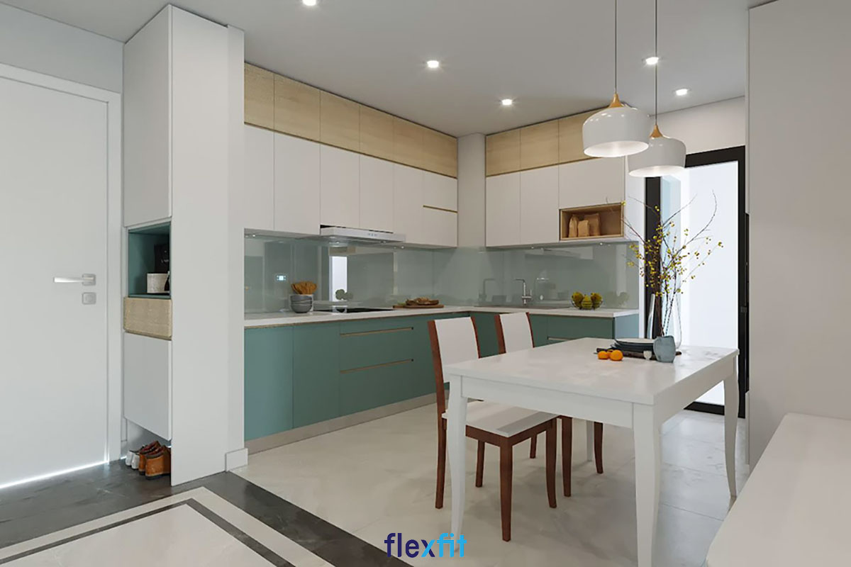 Màu xanh ngọc phối cùng màu trắng thanh nhã của tủ bếp chữ L này tạo cho không gian nhà bếp của bạn cảm giác dịu dàng, tươi mới. Tủ bếp dưới được thiết kế thành các ngăn tủ ngang, dọc đảm bảo công năng lưu trữ và sự tiện dụng nhất cho người dùng.