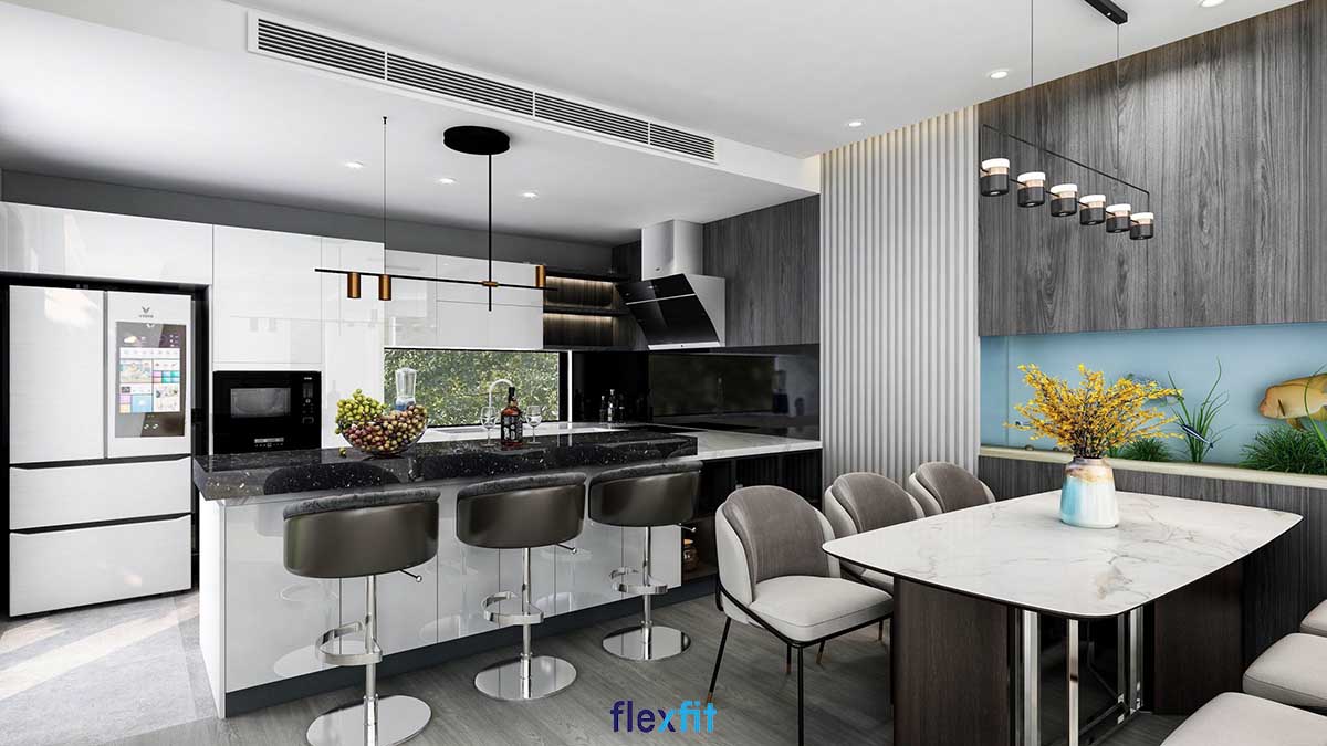 Phòng bếp setup bàn đảo mặt đá màu đen vừa sạch sẽ vừa sang trọng, có thể linh hoạt làm thành bàn ăn nhanh tiện dụng