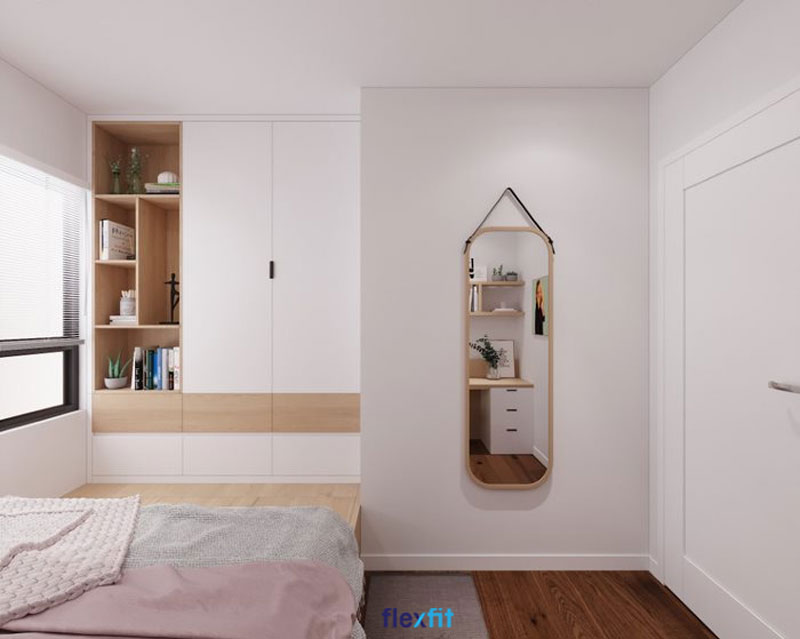 Mẫu tủ quần áo trên làm từ chất liệu lõi MDF phủ Melamine hạn chế trầy xước, giúp tủ luôn mới đẹp. Tủ phối màu trắng và nâu vân gỗ cho vẻ đẹp nhẹ nhàng, tươi trẻ, có thêm kệ trang trí và liền mạch với giường ngủ giúp tối ưu không gian.
