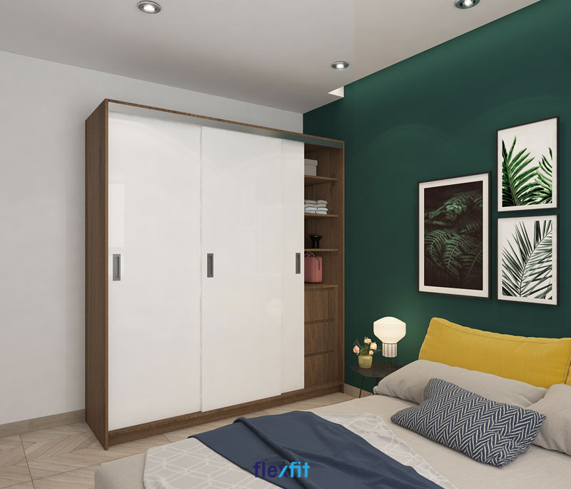 Nhấn chút sắc nâu vân gỗ sáng trên tông nền trắng thanh nhã giúp cho chiếc tủ quần áo cửa lùa 3 cánh 3m lõi MDF phủ Melamine ấn tượng hơn