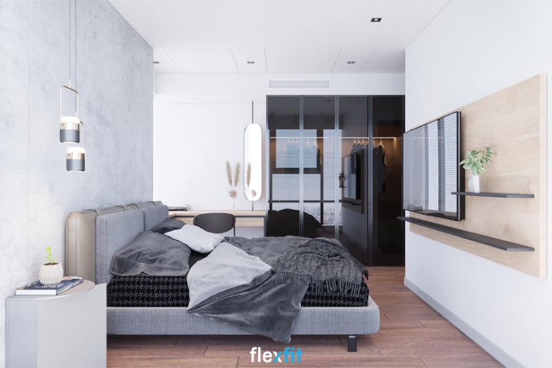 Tuy sử dụng tủ quần áo 2m6 lõi MDF phủ Laminate 4 cánh nhưng phòng ngủ không hề có cảm giác chật hẹp mà còn tạo cảm giác nới rộng không gian nhờ thiết kế cánh kính dạng lùa tiện lợi