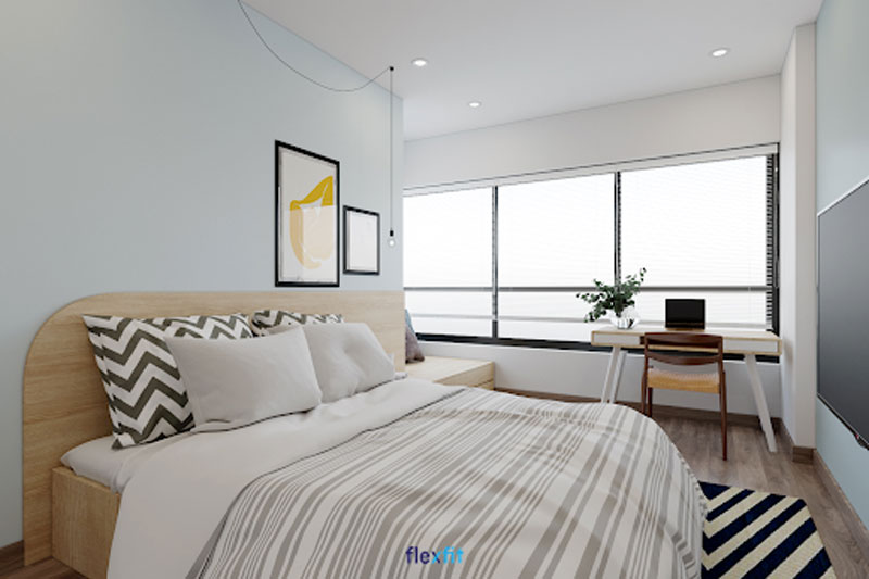 Bàn làm việc (90 x 120cm) tối giản cùng thiết kế giường bệt chuẩn phong cách Nhật ưa chuộng sự đơn giản mà tinh tế, tiện nghi. Bàn có màu trắng phối vân gỗ đồng bộ với màu giường ngủ, sơn tường tạo không gian tươi mới, thoáng đãng.