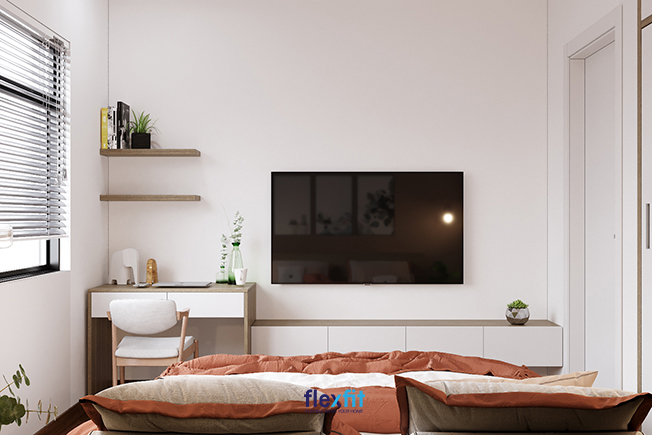 Bàn làm việc đẹp màu trắng và vân gỗ tích hợp kệ trang trí đơn giản vừa để sách, vừa trang trí. Phòng ngủ nhỏ đặt bàn làm việc gần ngay cửa sổ đón ánh sáng tự nhiên giúp không gian làm việc tràn sức sống, tăng hứng khởi.