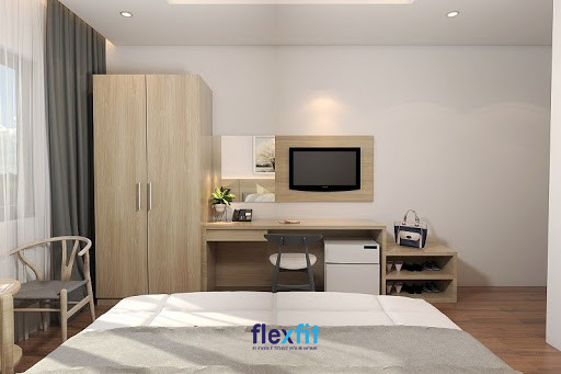 Mẫu bàn làm việc được thiết kế đơn giản, gắn với tủ quần áo tạo một khối thống nhất. Mẫu bàn giúp tiết kiệm không gian phòng, nhưng vẫn đảm bảo diện tích lưu trữ lớn.