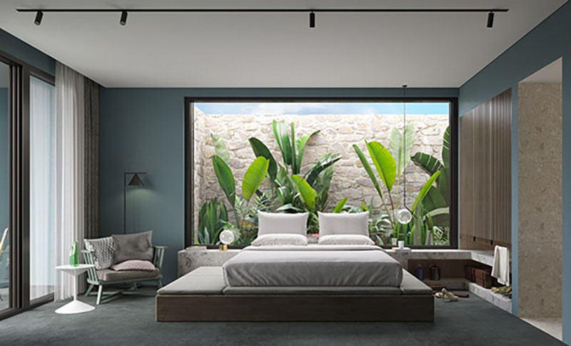 Phòng ngủ master với điểm nhấn có không gian xanh ở đầu giường